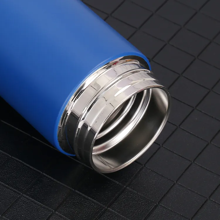 Detail of the open stainless steel neck, shown on the same bottle in blue